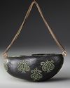A QAJAR COCO-DE-MER BEGGAR'S BOWL (KASHKUL), PERSIA, 19TH CENTURY