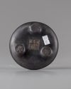 A Chinese bronze tripod censer