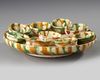 A CHINESE SANCAI GLAZED TRAY AND NINE CUPS, TANG DYNASTY (618-906 AD)