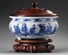A Chinese blue and white 'Eight Immortals' tripod censer