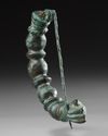A GREEK PHRYGIAN BRONZE ARM FIBULA BROOCH, CIRCA 6TH CENTURY B.C.