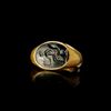 A LARGE ROMAN GOLD RING WITH A BLACK JASPER INTAGLIO OF MINERVA/ATHENA, 1ST CENTURY AD