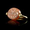 A PHOENICIO - RING WITH A CARNELIAN SCARABOID, 7TH-8TH CENTURY BC