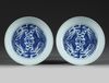 A PAIR OF CHINESE BLUE AND WHITE 'PHOENIX' DISHES