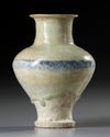 A RAQQA BLUE AND WHITE POTTERY JAR, SYRIA, 13TH CENTURY