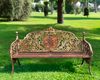 A CONTINENTAL CAST IRON GARDEN BENCH IN 19TH CENTURY STYLE, MID 20TH CENTURY, AFTER THE ‘MEDALLION’ DESIGN BY COALBROOKDALE
