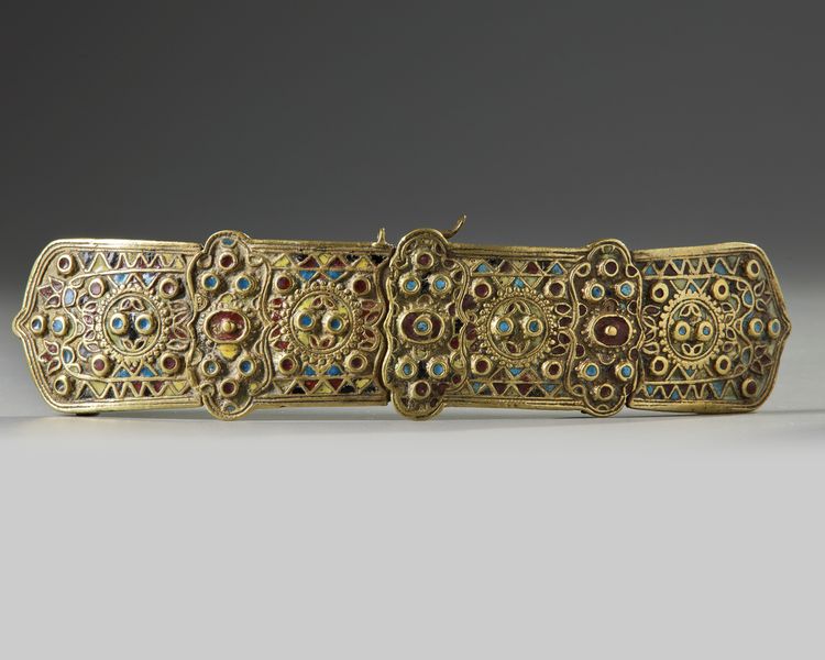 AN OTTOMAN BRASS BELT BUCKLE