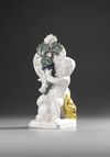 A  SCHREZHEIM FAIENCE STATUETTE 'ALLEGORY OF AUTUMN', 18TH CENTURY