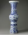 A large Chinese Ming-style blue and white 'mythical beasts' gu vase