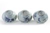 Three Chinese blue and white 'floral' bowls