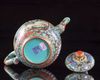 A Chinese green-ground famille rose 'Hui Mountain Retreat' teapot and cover