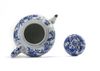 A large Chinese blue and white 'birds and flowers' teapot and cover