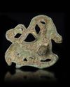A SEATED MYTHOLOGICAL BRONZE RAM, ORDOS PERIOD