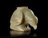 A NEAR EASTERN GREENISH CALCITE VESSEL IN THE SHAPE OF A BIRD OF PREY, 3RD MILLENNIUM BC