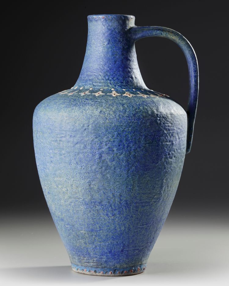 A MONUMENTAL TURQUOISE-BLUE GLAZED POTTERY JUG, SPAIN, CIRCA 15TH-16TH CENTURY
