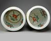 A pair of Chinese famille rose 'dragon and phoenix' jardinieres