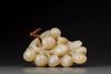 A creamy jade 'squirrel and grapes' group