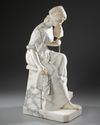 AN ALABASTER AND MARBLE SCULPTURE OF A SEATED WOMAN ROLLING WOOL, CIRCA 1890