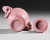 A CARVED PINK STONE LION VASE,  CHINA, 20TH CENTURY