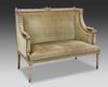 A FRENCH CARVED AND GRAY LACQUERED WOODEN SOFA, LOUIS XVI STYLE, LATE 19TH CENTURY