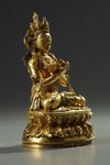 A Sino-Tibetan gilt bronze figure of Vajradhara