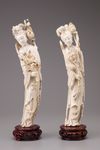 A pair of ivory standing figures of Meiren