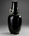 A RARE FAMILLE ROSE-DECORATED MIRROR-BLACK-GLAZED DOUBLE-GOURD VASE, CHINA, 18TH CENTURY