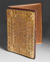 A KASHMIRI STAMPED AND GILT LEATHER BINDING, 19TH CENTURY
