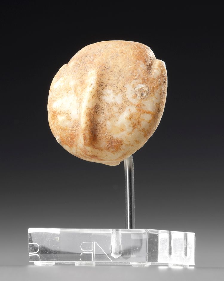 A HEAD OF A MARBLE IDOL, KILIYA TYPE, WESTERN ASIATIC, CIRCA 2700-2400/2300 BC