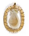 A GOLD MOUNTED AGATE PENDANT