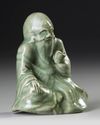A CHINESE CELADON FIGURE CENSER,  MING DYNASTY, 15TH CENTURY