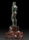 A GRECO ROMAN BRONZE STATUETTE OF HERAKLES, CIRCA 1ST CENTURY B.C. / A.D.