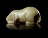 A CHINESE CARVED JADE MYTHICAL BEAST, QING DYNASTY (1644–1911)