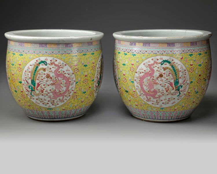 A pair of Chinese famille rose 'dragon and phoenix' jardinieres