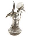 A SILVER COFFEE POT OR DALLAH  OMAN NIZWA, CIRCA 1940-1950