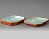 A Chinese coral-ground famille rose octagonal seal paste box and cover