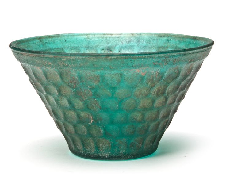 A PERSIAN GREEN CUT GLASS BOWL, 9TH-10TH CENTURY