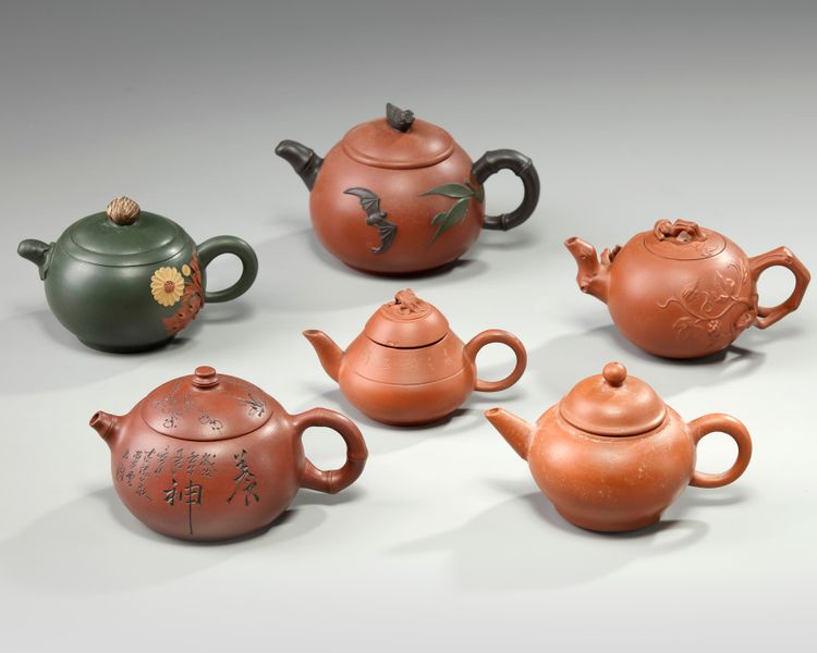 A group of six Chinese small yixing teapots