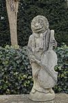 A CARVED LIMESTONE CLOTHED MONKEY PLAYING THE VIOLIN, 18TH CENTURY