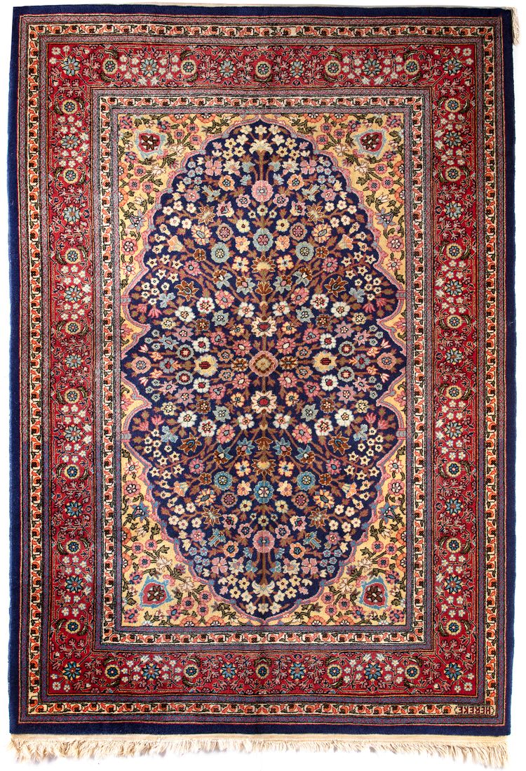 A HEREKE WOOL RUG, CA. 1950-1960