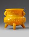 A CHINESE OPAQUE YELLOW GLASS TRIPOD CENSER 