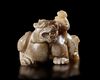 A CHINESE JADE OF AN IMMORTAL RIDING A BIXIE,  HAN DYNASTY (206 BC–220 AD)