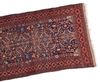 A BELUTSCH RUG WITH PARADISE DESIGN AND ANIMALS, LATE 19TH CENTURY
