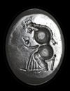 A GRECO PERSIAN AGATE SCARABOID STAMP SEAL, CIRCA LATE 4TH-EARLY 3RD CENTURY B.C.