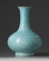 A Chinese turquoise-ground slip-decorated bottle vase