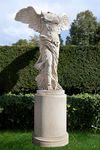 A LARGE AND IMPRESSIVE SCULPTED LIMESTONE MODEL OF THE SAMOTHRACE NIKE, LATE 20TH CENTURY
