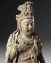 A large Chinese polychrome-decorated wood carving of Guanyin