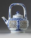 A Chinese blue and white reticulated teapot and cover