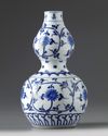 A Chinese blue and white double gourd vase