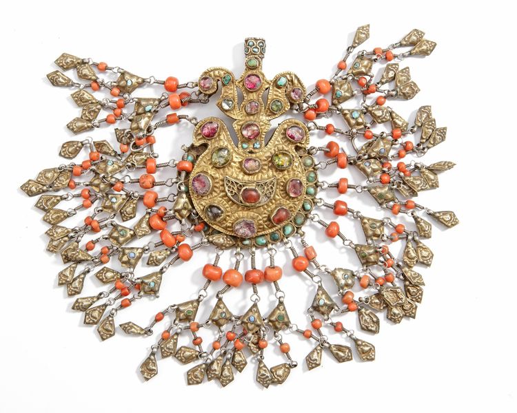 A SILVER UZBEK PARKHONA PENDANT, 19TH CENTURY